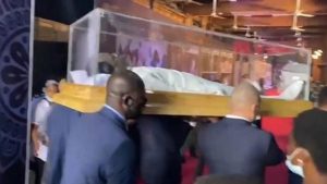 Read more about the article TB Joshua lies inside a transparent glass casket as his funeral service is underway (video)
